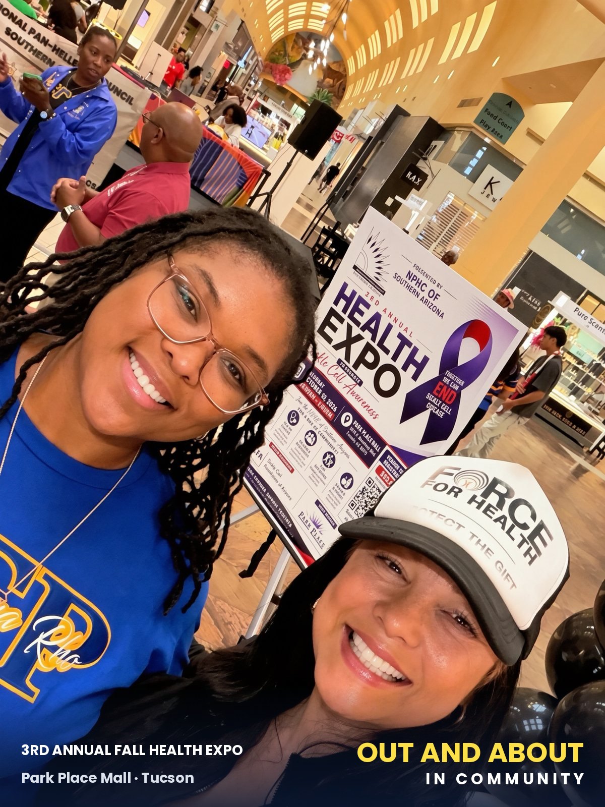 Coach Lucy with Expo co-chair Cierra Conerly at the Expo poster.