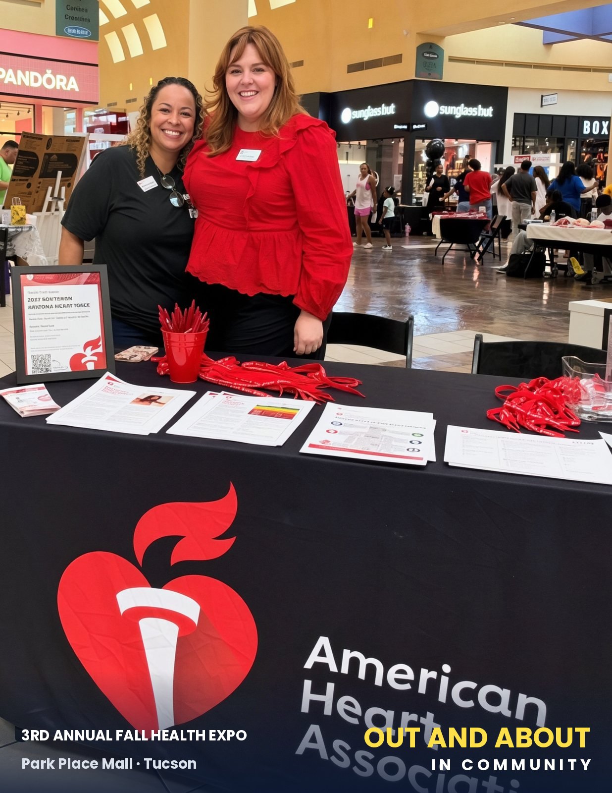 The American Heart Association team at their heart-health table.
